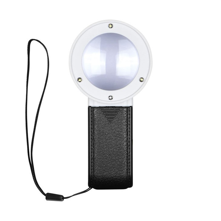 روشنی کے ساتھ ہاتھ کا میگنفائنگ گلاس